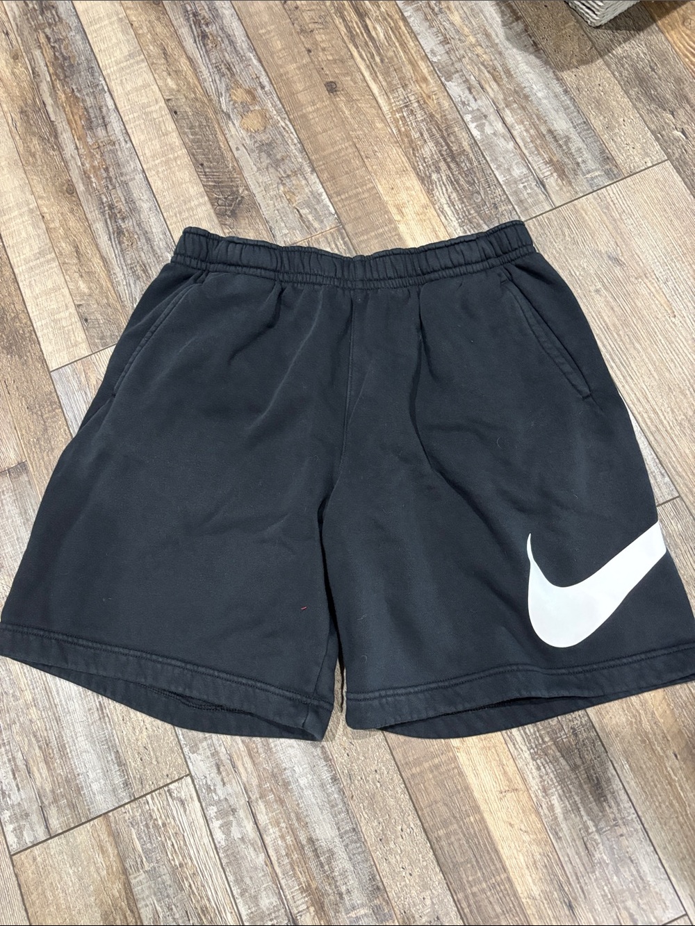 Nike Men’s Black Athletic Shorts with White Swoosh Logo